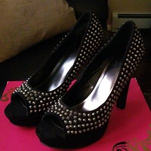 Womans peep toe suede and silver grommet pumps